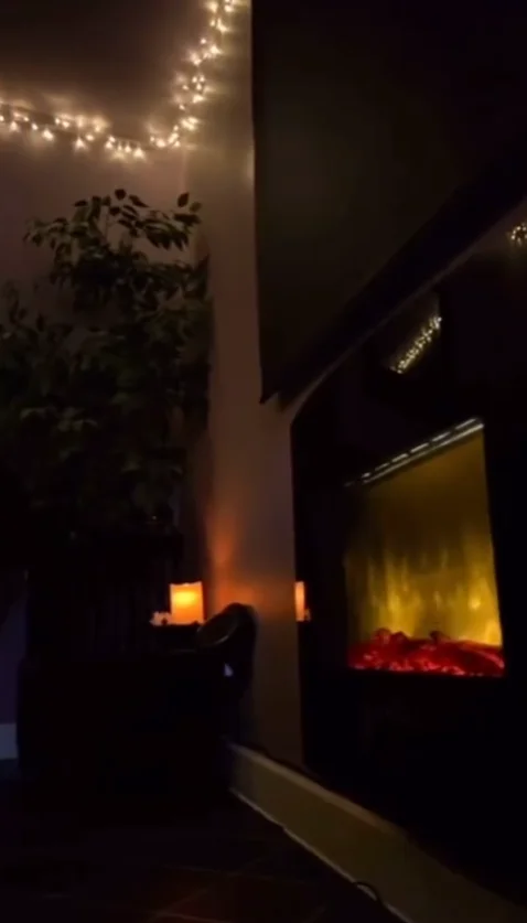 Cozy spa ambiance with fireplace and candles