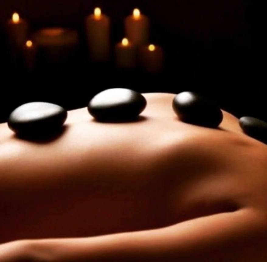 Hot stone massage therapy treatment